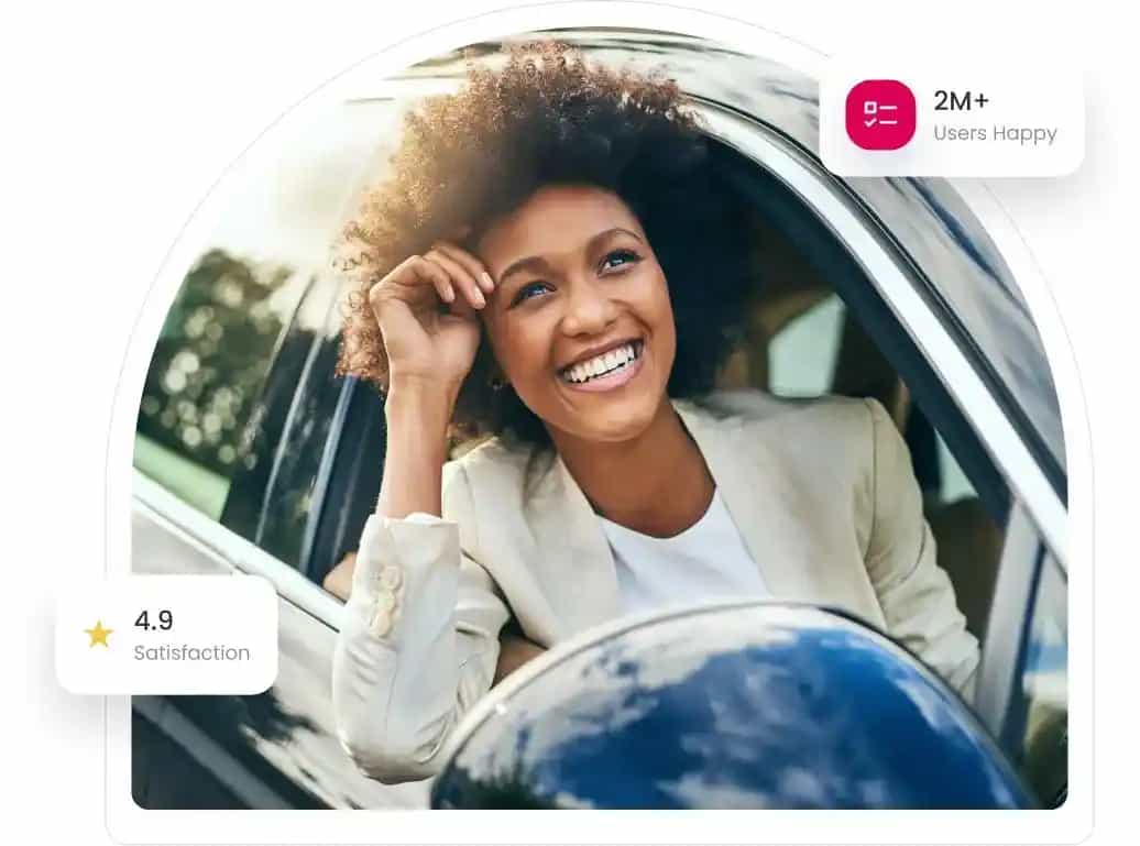 A happy customer of an affordable insurance agency a girl smiling sitting on a car for getting affordable insurance with maximum coverage.